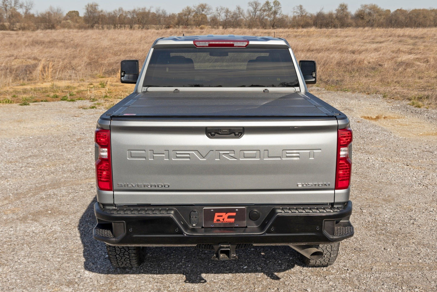 Hard Tri-Fold Flip Up Bed Cover | 6'9" Bed | Chevy/GMC Silverado/Sierra 2500HD/3500HD (20-26)